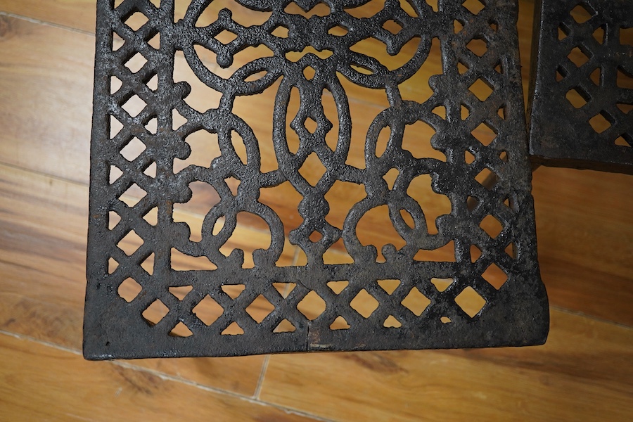 A pair of Victorian rectangular cast iron trivets, 43cm wide
